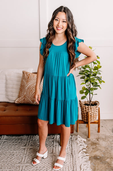 Flutter Me This Babydoll Dress In Calypso
